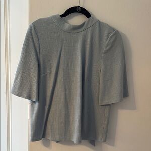 Anthropologie Current Air blue bow tie back Textured Top